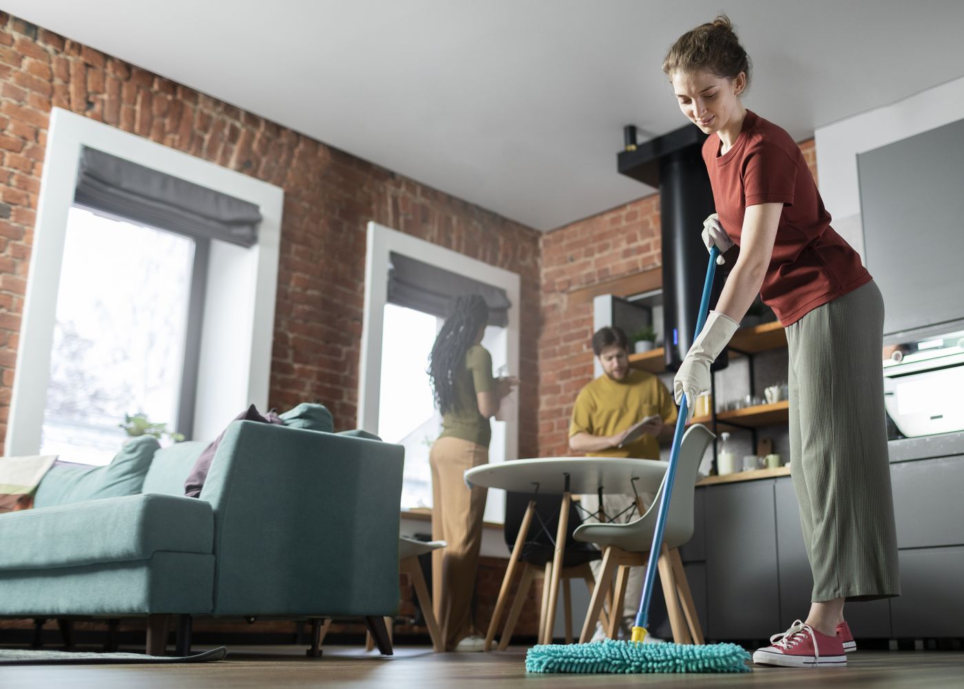 Kraphie team working together on a cleaning project